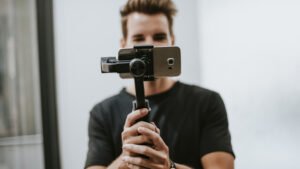 Man holding a gimbal with a phone